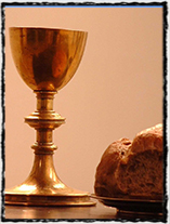 Symboly husitství: kalich s vínem a chléb nachystaný pro vysluhování Večeře Páně pod obojí způsobou, které bylo součástí jednoho ze 4 artikulů (zdroj: www.nase-reformace.cz).